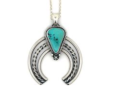 This handcrafted beautiful Naja Pendant-Necklace features a fabulous piece of 'Turquoise Mountain' Turquoise, sourced from Arizona. The pure silver bezel holds the stone securely in place, while the remaining silver elements, such as star-clad detail, backing, bail, and Naja base, are all expertly crafted from high-quality 925 sterling silver. The design is accentuated by heavily oxidizing, sanding, and highly polishing the silver. This timeless Naja necklace is a must-have for any collection! S Western Style Nickel-free Turquoise Necklace, Southwestern Sterling Silver Turquoise Necklace With Large Stone, Turquoise Oxidized Spiritual Necklace, Turquoise Sterling Silver Necklace With Oxidized Finish, Sterling Silver Turquoise Necklace With Oxidized Finish, Spiritual Turquoise Necklace With Oxidized Finish, Western Style Turquoise Necklace With Large Pendant, Handmade Western Silver Turquoise Necklace, Traditional Silver Turquoise Necklace With Gemstone