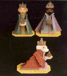 four crocheted figurines are shown in three different colors and sizes, one is wearing a tiara