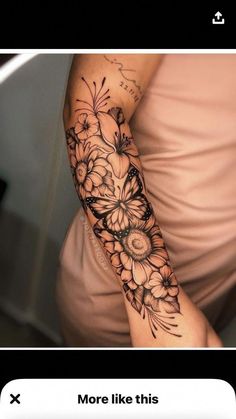 a woman's arm with flowers on it and the words more like this written below