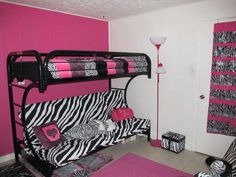 a zebra print bunk bed in a girls bedroom