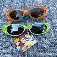 Disney Girl Sunglasses Lot Of 2 Eye Wear Kids Sunglasses Uv Protection Shades Brand: Disney Color: Blue And Orange Lot Of 2, One Disney And One Is Unbranded Brand New. Never Used. Stitch Sunglasses, Girl Sunglasses, Disney Colors, Sunglasses Uv Protection, Girl With Sunglasses, Eye Wear, Kids Sunglasses, Disney Accessories, Blue And Orange