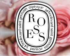 the logo for roses is surrounded by pink flowers