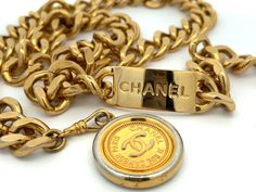 CHANEL Vintage Medallion Coin Chain Belt Yellow Gold Chain Link Jewelry With Gold-tone Logo, Elegant Gold Jewelry With Logo Plaque, Gold Metal Necklaces With Gold-tone Logo Plaque, Elegant Gold-tone Chain Link Jewelry With Logo Plaque, Elegant Gold-tone Chain Link Jewelry, Formal Gold Jewelry With Metal Logo, Elegant Gold Jewelry With Metal Logo, Vintage Gold Necklace With Gold-tone Logo Plaque, Vintage Jewelry With Gold-tone Logo Plaque