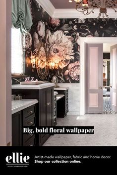 a bathroom with floral wallpaper and chandelier