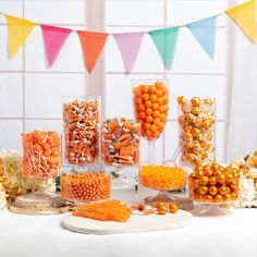 a table topped with lots of candy and candies