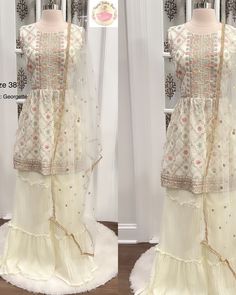 size 38 Product Name: Beautiful Ivory Color Sharara Set with Multicolor Sequin Work Description: Indulge in sheer elegance with our Beautiful Ivory Color Sharara Set featuring exquisite multicolor sequin work. This stunning ensemble exudes sophistication and charm, perfect for those special occasions that demand attention. The ivory color adds a touch of grace, while the intricate multicolor sequin detailing elevates the outfit's allure. The set includes a beautifully designed kurta-style top an Designer Embellished White Palazzo Set, White Embellished Palazzo Set For Designer Wear, Embellished White Palazzo Set For Designer Wear, Fitted Cream Palazzo Set With Dupatta, Multicolor Palazzo Set With Mirror Work For Reception, White Georgette Dress With Mirror Work, Fitted Cream Sharara With Mirror Work, Festive Cream Georgette Palazzo Set, Festive White Embellished Palazzo Set