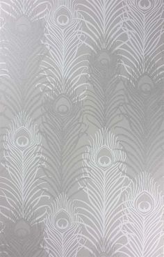 the back side of a wallpaper with an image of a peacock pattern on it