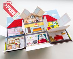 a paper model of a house with the words free on it's front and side