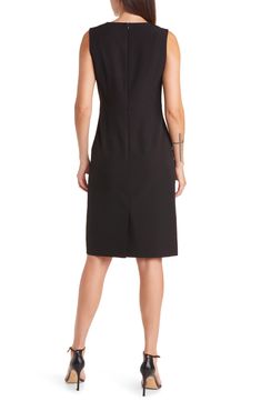 This smart and sophisticated sheath is designed in a versatile solid hue with plenty of stretch in the twill fabric for easy movement all day long. Jewel neck Sleeveless 89% polyester, 11% spandex Dry clean Imported Stretch Sleeveless Elastane Dress For Formal Occasions, Formal Stretch Sleeveless Elastane Dress, Stretch Elastane Sleeveless Dress For Formal Occasions, Sleek Sleeveless Knee-length Dress For Formal Occasions, Sleek Sleeveless Knee-length Formal Dress, Sleek Knee-length Sleeveless Dress For Formal Occasions, Fitted Sleeveless Elastane Dress For Work, Sleeveless Midi Dress For Business, Sleeveless Sleek Midi Dress For Work