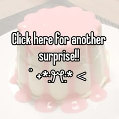 a cake with pink icing on it that says, click here for another surprise