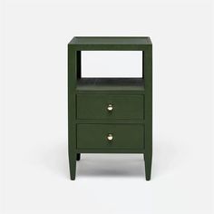 a green night stand with two drawers and one drawer on the bottom, in front of a white background