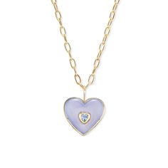 18K Yellow Gold, Carved Blue Chalcedony, Blue Sapphire Heart Inset    Hand-carved in NYC, each natural carved stone   will have slight variations in characteristics (color, tone, patterns).    Dimensions     Height: ~27mm Width: ~30mm  Chain: 18" Oval Chain Luxury Blue Heart-shaped Necklace, Brent Neale, Chalcedony Necklace, Signature Bracelet, Precious Rings, Puffed Heart, Carved Stone, Pillow Collection, Crown Jewels