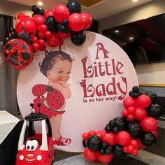 a lady bug themed birthday party with balloons