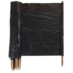 black plastic bags with wooden sticks sticking out of the bottom one side and two sides