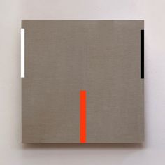 an abstract painting with orange and grey lines on the bottom half of it, against a white wall