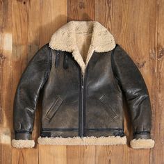 New Flying Aviator Bomber Distressed Leather Jacket, Shearling Faux Fur Real Lambskin Leather jacket *Item Feature *New with tags *Genuine Lambskin leather  *Distressed Leather  *Faux Shearling Fur  *Premium stitching  *Original Brass material  *Original YKK Zipper  *Will be best leather jacket in your wardrobe    *We will Deliver This item Same as Shown in Picture Its Our Grantee Buy With Confidence     We can Offer you customized size/ customized design and Color Changes You can also ask us fo Rugged Sheepskin Outerwear, Sheepskin Leather Jacket With Fleece Lining For Fall, Fall Sheepskin Leather Jacket With Fleece Lining, Sheepskin Aviator Jacket With Faux Fur Lining, Rugged Brown Shearling Leather Jacket, Fall Aviator Sheepskin Fur Coat, Shearling Biker Jacket With Faux Fur Lining, Sheepskin Aviator Outerwear For Fall, Shearling Aviator Fur Coat For Fall