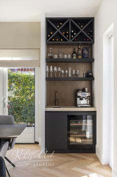 a wine rack in the corner of a dining room