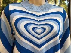 "Blue hearts knit sweater. No tags - estimated medium. It is in great condition without flaws; no pulls, no mends, no odors.  Look and feel great in this warm sweater! Approximate measurements taken across front laid flat: Bust 18\" Waist 18\" Length 22\" Sleeves 23.5\" If you have any questions please feel free to message me. Thanks for looking!" Fitted Heart Print Sweater For Fall, Knit Crew Neck Sweater With Heart Print, Long Sleeve Knit Tops With Heart Print, Knit Long Sleeve Tops With Heart Print, Knitted Crop Sweater, Crop Sweater Vest, Code Clothes, Rainbow Cardigan, Aelfric Eden