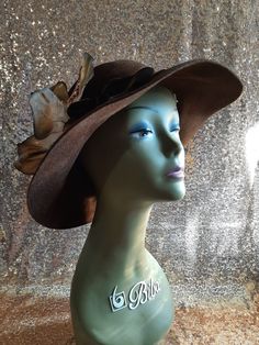 Check out this beautiful Vintage Betmar brown wool felt Floppy hat in excellent pre-loved condition, with a brown velvet ribbon bow and Lily cloth flower by side. very feminine elegant look. Size: 6.75" Dia. US and Canada orders $35 USD and above will deliver for free.  Thank you to watch my store. I sell vintage and handmade items and I try to describe them accurately, items are may be brand new, used and ages defected. You can evaluate the condition of the items in the photos but do not hesita Brown Fedora For Kentucky Derby And Formal Occasions, Brown Brimmed Evening Hat, Evening Brown Brimmed Hat, Elegant Fitted Brown Felt Hat, Formal Brown Brimmed Hat, Formal Brown Felt Hat With Short Brim, Elegant Brown Fedora For Fall, Brown Formal Felt Hat For Winter, Brown Brimmed Felt Hat For Formal Occasions