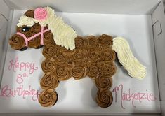 a birthday cake in the shape of a horse