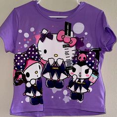 Brand New Hello Kitty Crop Shirt Size Md 48% Cotton 48% Polyester 4% Spandex Smoke Free Home No Returns. Purple Cotton Y2k T-shirt, Purple Y2k Crew Neck Top, Hello Kitty Crew Neck Top, Fitted Hello Kitty Crew Neck Top, Fitted Cotton Hello Kitty Top, Purple Y2k Short Sleeve Tops, Y2k Purple Short Sleeve Tops, Purple Short Sleeve Y2k Top, Purple Short Sleeve Y2k Style Tops