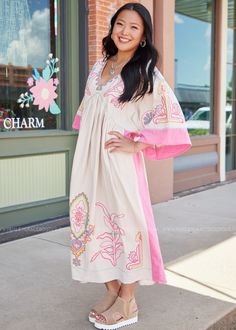 Breezy Linen, Delicate Embroidery—A Match Made In Dress Heaven! 🌿 Taupe w/ Pink Contrast & Embroidery V-Neckline | 3/4 Sleeves | Tiered Hemline Linen Feel | No Stretch | Relaxed Fit Has Pockets Main: 90% Cotton 10% Linen Measurements Bust Measured Laid Flat Across Front | Armpit to Armpit S 23” | M 24” | L 25" | XL 26” Length Measured Shoulder to Hemline S 48” | M 49” | L 50” | XL 51” Model: Mia is wearing the Small; Heather wears the Medium; Carolyn wears an XL Brand: Bluevelvet Bohemian Maxi Dress With Embroidered Hem And V-neck, Peasant Style Embroidered V-neck Dress, Beach Embroidered Dress With V-neck And Embroidered Hem, Folk V-neck Dress With Embroidered Hem, Embroidered Folk V-neck Dress, Contrast Embroidery, Pink Contrast, Delicate Embroidery, Heart Dress