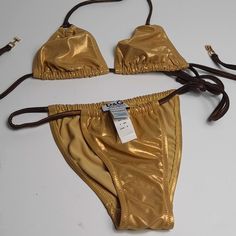 Dolce Gabbana Beach Wear Size Us 00 Eu 0 ,Bikini Is Fully Adjustable With Ties On Sides,Color Golden ,Never Used Without Tag ,Dolce Gabbana Is A Luxury Brand Difficult To Find For This Reason Please Just Serious Offer Luxury Summer Swimwear For Vacation, Luxury Fitted Beach Swimwear, Luxury Gold Swimwear For Party, Gold Tie-side Bottom Swimwear For Swimming, Luxury Gold Swimwear For Summer, Luxury Fitted Swimwear For Vacation, Gold Tie-side Swimwear For Pool, Gold Tie-side Bottom Swimwear For Pool, Gold Summer Swimwear For Swimming