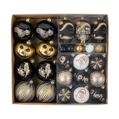 a box filled with assorted christmas ornaments