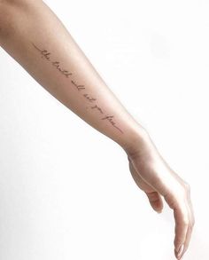 a person's arm with a tattoo that reads, i love you to the moon and back