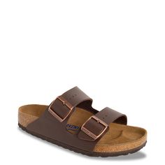 Metallic buckle detailing and bold straps freshen the look and feel of these men's Birkenstock Arizona Soft Footbed dark brown slide sandals. Made of durable leather upper, these slides have a round open toe, easy slip-on entry, and two straps, each with an individually adjustable metal pin buckle for a precise fit. Features include a soft a footbed made of cork with natural suede leather top cover to offer plush comfort all through the day, and a lightweight EVA traction outsole with patterned tread. | Birkenstock Men's Arizona Soft Footbed Slide Sandal in Dark Brown Leather Size EU 42/US 9-9. 5 Medium Men Birkenstock, Birkenstock Men, Mens Shoes Sandals, Birkenstock Sandals, Birkenstock Arizona, Birkenstock Shoes, Dark Brown Leather, Leather Top, Slide Sandals