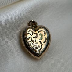 Cute hollow gold filled heart pendant with decoratve etching.  Pre-loved item. Stamped GF for gold filled BIRKS. Size: 2cm tall, 1.5cm wide.  Weight: 1.479g **FREE shipping within Canada and USA** If you have any questions or concerns, please do not hesitate to contact us. We will be more than happy to help you and answer any inquiries.  We invite you to check out our shop for more fabulous items! Vintage Gold Heart Charm Necklace, Heart-shaped Gold Jewelry With Vintage Charm, Vintage Gold Heart Pendant Necklace, Antique Gold Jewelry With Heart Charm, Victorian Gold Heart Pendant Jewelry, Victorian Heart-shaped Gold Jewelry, Vintage Yellow Gold Heart Charm Necklace, Gold Heart Necklace With Vintage Charm, Vintage Yellow Gold Heart Necklace