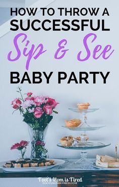 a baby shower party with pink flowers and desserts on the table in front of it