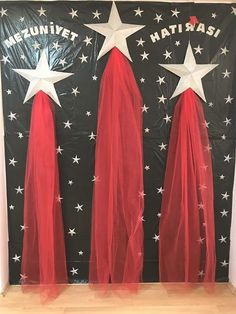 two red capes with white stars on them and the words dynamite, hattassa