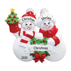 two snowmen holding a christmas tree ornament with names on it and the words patrick, lauren, 1st christmas