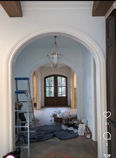 an archway is being worked on in a house