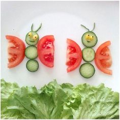 some cut up vegetables sitting on top of a white plate next to lettuce