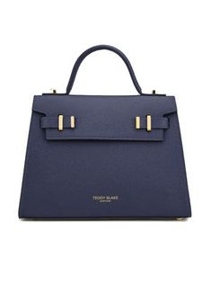 Introducing New Ava by Teddy Blake, Italy-crafted chic bag. Grained calf leather, single handle, flap closure, organized suede interior. Day-to-night elegance Made in Italy Italian Leather Handmade by Experts Blue Luxury Flap Bag For Formal Occasions, Luxury Blue Flap Bag For Formal Occasions, Classic Blue Formal Flap Bag, Blue Top Handle Flap Bag For Formal Occasions, Formal Blue Flap Bag With Detachable Strap, Modern Blue Flap Bag For Formal Occasions, Timeless Blue Shoulder Bag For Evening, Blue Top Handle Flap Bag For Evening, Blue Evening Flap Bag