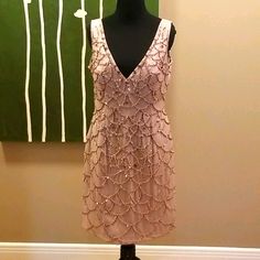 Beautiful Beaded Cocktail Dress. Vneck And V In The Back. Zipper In Back. Beautiful Shades Of Pink And Gold Beads And Sequins In A Lovely Scalloped Pattern. Very Flapper And Gatsby Roaring 20s Style. Bought For A Cruise And Never Wore It Nwot. Sitting In Closet Ever Since. This Baby Needs To Shine! Make Me An Offer. Smoke And Pet Free Home. Set This Beauty Free Glamorous Beaded V-neck Dress, Roaring 20s Style, Roaring 20s Fashion, Basix Black Label, 20s Style, Gatsby Dress, Sue Wong, Beaded Cocktail Dress, 20s Fashion