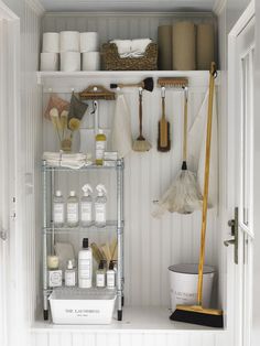 an organized bathroom closet with toiletries and cleaning supplies