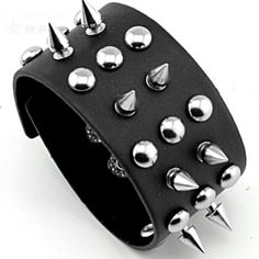 CindyDo you want to add a punk rock accessory to your biker collection that will turn heads everywhere you go? If so, these Badass Rockstar Bracelets w/ Metal Spikes are everything you’re looking for, and more. Made of high-quality PU leather and sturdy alloy, these Badass Rockstar Bracelets w/ Metal Spikes are extremely durable and comfortably fit on your wrist. Because of the quality of the materials, these Badass Rockstar Bracelets w/ Metal Spikes will keep their good shape for a very long ti Punk Style Jewelry For Halloween Concert, Black Band Wristband For Concerts, Adjustable Black Punk Wristband, Black Punk Bracelets For Festival, Adjustable Punk Bracelets For Biker Events, Adjustable Punk Bracelet For Streetwear, Black Punk Festival Bracelets, Adjustable Punk Bracelets For Streetwear, Edgy Band Bracelet For Concerts