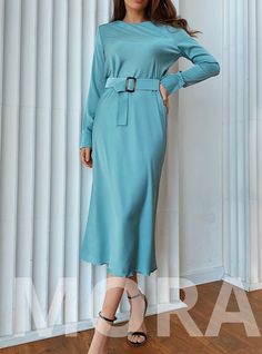 This silk long sleeve dress is modest and elegant. The belt underlines the waistline and transforms the body contour. The fabric is very pleasant to touch. Owing to the bias cut of the fabric, it ripples nicely and attractively.  Perfect modest outfit for wedding guests, bridesmaids, birthdays, anniversaries and office. DETAILS -  long-sleeved silk dress -  bias cut dress -  belted -  hits at mid-calf -  model is wearing a size S -  modest dress MATERIAL Silk and polyester blend SIZES Dress leng Light Blue Long Sleeve Formal Dress, Formal Light Blue Long Sleeve Dress, Modest Long Sleeve Maxi Dress For Work, Blue Long Sleeve Midi Dress For Office, Formal Blue Long Sleeve Midi Dress, Elegant Blue Long Sleeve Midi Dress, Long Sleeve Maxi Dress For Office, Solid Long Sleeve Maxi Dress For Office, Solid Color Long Sleeve Maxi Dress For Office