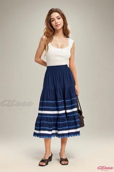 Qteee - High-waisted Half-skirt with French-inspired Layered Blue Design and Wave Edge Blue Gathered Maxi Skirt For Summer, Blue Gathered Skirt For Summer, Blue Pleated Skirt For Vacation, Casual Blue Gathered Skirt, Casual Blue Skirt With Gathered Detail, Chic Blue Cotton Skirt, Blue Lined Tiered Skirt, Chic Blue Cotton Maxi Skirt, High-waist Blue Skirt With Ruffles