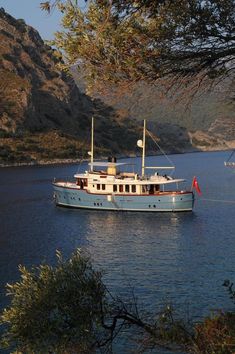 a boat floating on top of a large body of water