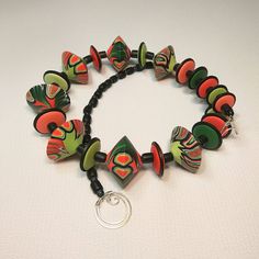 Hey, I found this really awesome Etsy listing at https://www.etsy.com/listing/570890693/red-green-statement-abstract-bead Handmade Eclectic Red Jewelry, Artistic Multicolor Necklaces With Large Beads, Unique Green Adjustable Necklace, Adjustable Eclectic Red Jewelry, Artsy Multicolor Round Pendant Necklace, Artistic Adjustable Necklace With Colorful Beads, Handmade Eclectic Adjustable Necklace, Eclectic Handmade Necklaces With Round Beads, Handmade Eclectic Necklaces With Round Beads