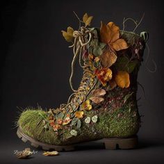 a pair of boots with flowers and leaves on the inside are made out of grass