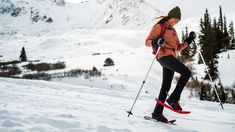 a woman on skis in the snow