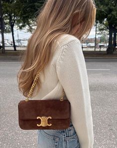 Explore the best luxury bags from the most coveted designer brands that every stylish woman should know about! These top brands, such as Celine with its timeless styles like this brown suede Triomphe shoulder bag, are perfect for adding a touch of elegance to any outfit. Luxury Designer Outfits, Handbag Brands, Everyday Handbag, Stylish Purse, Handbag Outfit