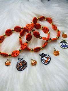 Halloween bracelets  These are the cutest pumpkins bracelets Our Bracelets are HANDMADE and designed with you in mind! Order Yours Today! Each bead in this bracelet are hand-picked and strung on a high-quality elastic stretch cord to ensure the best quality. These make perfect gifts for moms, grandmas, sisters, brides to be, bridesmaids, girls, baby shower, graduations, birthdays, bachelorette party, best friends, teachers... the list never ends :)  Please allow 1-3 days processing time when you purchase, as each piece is made especially for you! How to care for your bracelets:  *Remove before showering or swimming, avoid water when washing hands *Treat jewelry gently & with special care *Roll onto wrist instead of stretching open  *Do not leave out in direct Sunlight Orange Beaded Bracelets For Halloween, Handmade Beaded Bracelets For Halloween, Orange Halloween Gift Bracelet, Handmade Orange Novelty Bracelets, Halloween Gift Stretch Bracelet With Round Beads, Halloween Novelty Bracelet With Round Beads, Novelty Orange Bracelets For Halloween, Halloween Novelty Orange Bracelets, Orange Beaded Bracelets For Halloween Gift