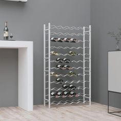 a wine rack with many bottles in it