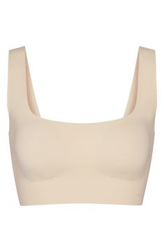 This supercomfy, buttery-soft wireless bra from Kim Kardashian's SKIMS has a pullover longline silhouette with extra smoothing at the straps, sides and back. Square neck Removable pads 70% nylon, 30% spandex Machine wash, line dry Imported Longline Bra, Wireless Bra, Fabric Gift Bags, Nordstrom Store, Fabric Gifts, Anniversary Sale, Free Fabric, Long A Line